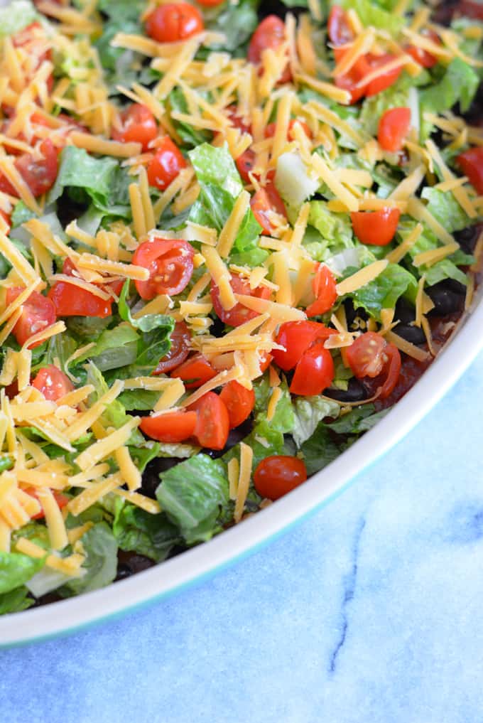 Taco Dip made with lower calorie ingredients adds a healthier choice to your next party menu.