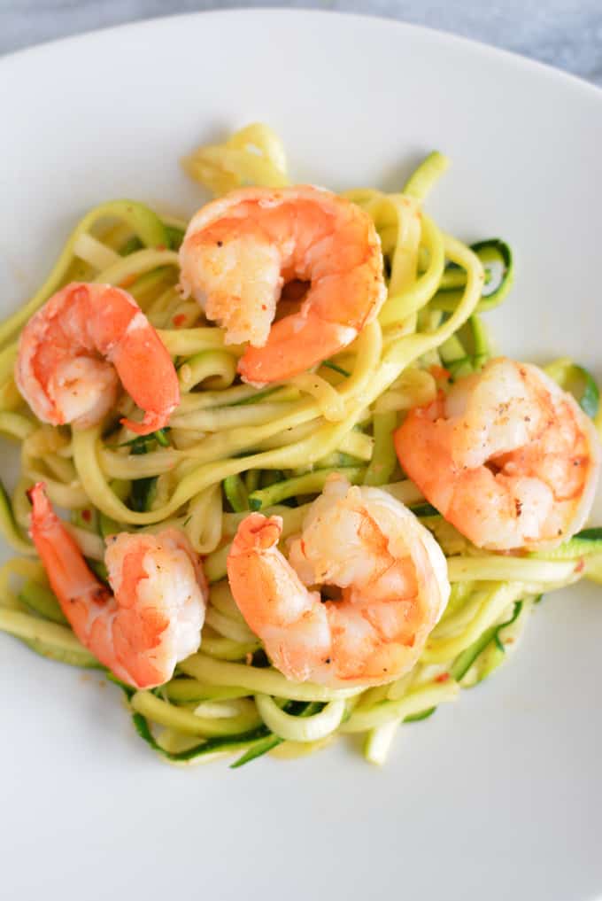 Sriracha Shrimp with Zoodles reminds you of a spicy noodle bowl without the calories of a big bowl  of pasta.