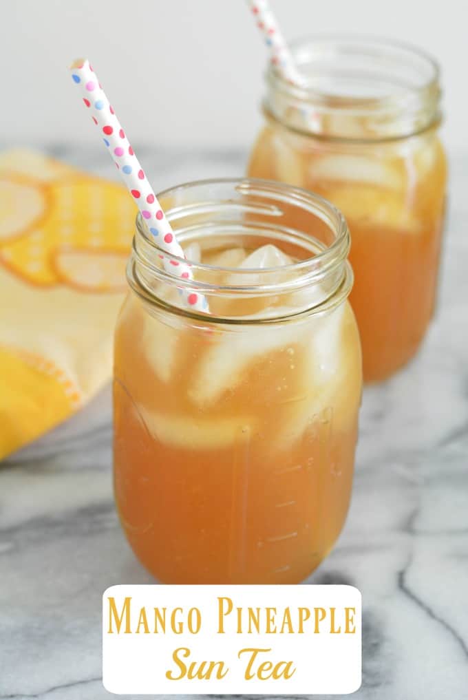 Flavored teas are usually made with lots of sugar. This mango pineapple sun tea is sweetened with just fruit. This summer tea is naturally sweetened and low in calories. #tea #beverage #summer #lowsugar #nourishedsimply