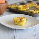 Roasted Pepper & Egg Breakfast Muffin on a white plate.