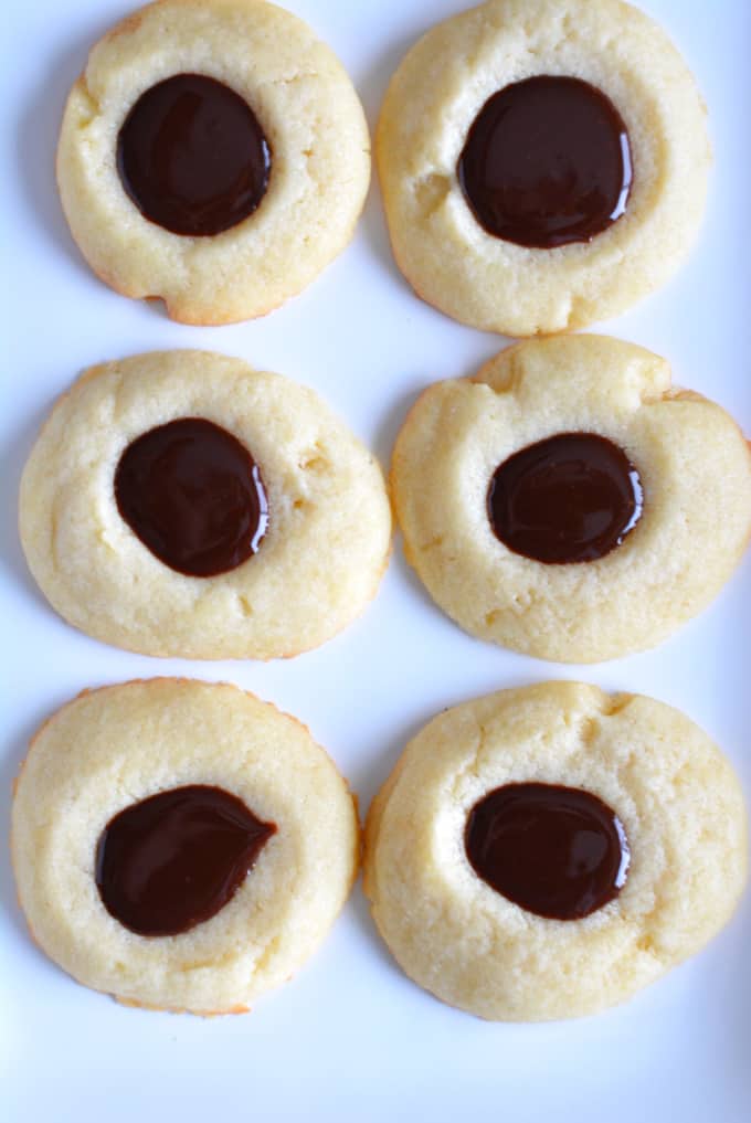 Chocolate Iced Thumbprint cookies just like you find in the bakery. Perfect for any holiday.