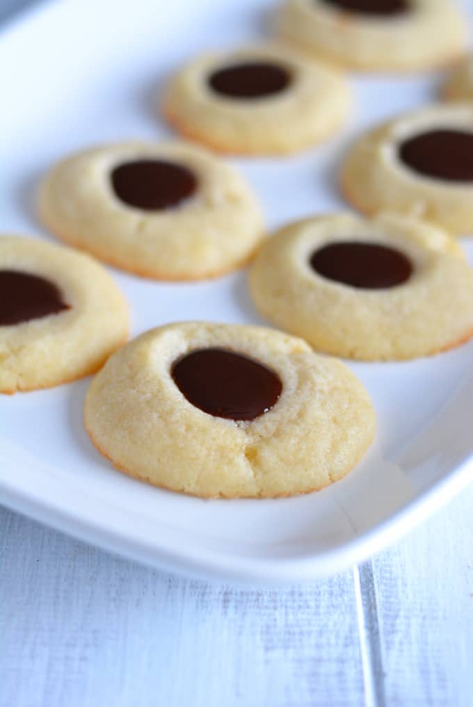 Chocolate Iced Thumbprint cookies just like you find in the bakery. Perfect for any holiday.