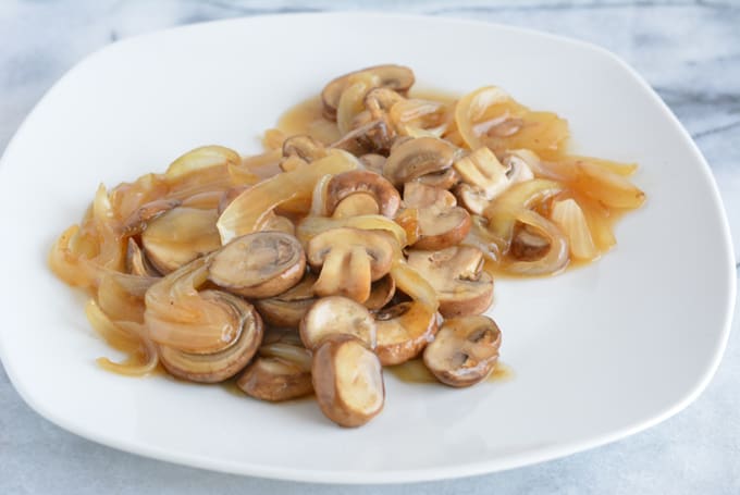 Top over your steak or beef entree with these meaty saucy mushrooms & onions.