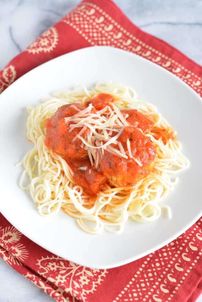Turkey meatballs with spaghetti on a plate.