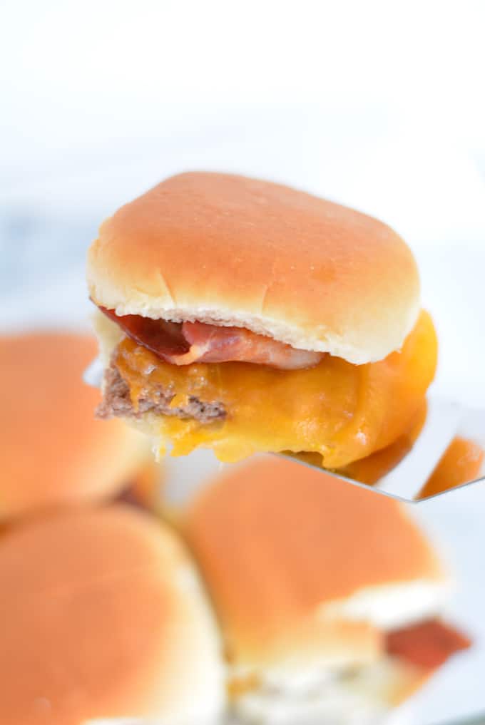 Bacon Cheddar Cheeseburger Sliders are the perfect game day snack. Baked in the oven there is no need to turn on your grill. Pepperidge farm sliders make game day easy. #sponsored #easyrecipes #gamedayrecipes #respectthebun #snacks #sliders #burgers
