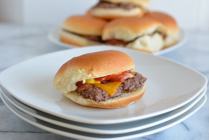 Bacon Cheddar Cheeseburger Sliders are the perfect game day snack. Baked in the oven there is no need to turn on your grill. Pepperidge farm sliders make game day easy. #sponsored #easyrecipes #gamedayrecipes #respectthebun #snacks #sliders #burgers