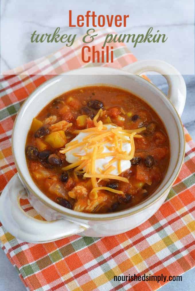 Leftover Turkey chili made with pumpkin puree, black beans, and butternut squash. A perfect way to use up leftover turkey. Ready to eat in just 30 minutes. #turkey #thanksgiving #hearthealthy #leftovers